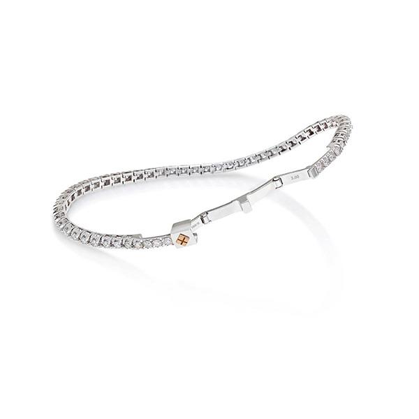 TENNIS IMPERDIBILE IN ORO BIANCO E CHIUSURA PIEGHEVOLE. DIAMANTI COLORE G, PUREZZA VSI, PESO CT 1.55 - CRIERI