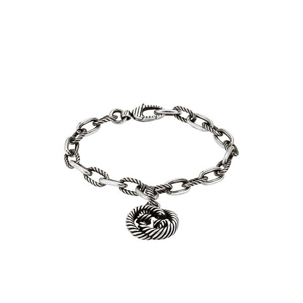 BRACCIALE INTERLOCKING G BRACELET WITH GG PENDANT AGED SILVER - GUCCI SILVER JEWELRY