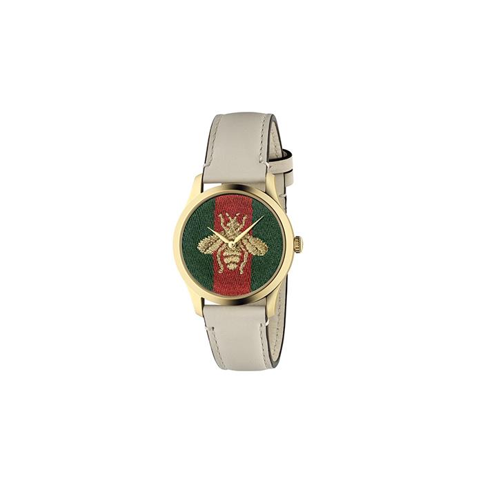 G-TIMELESS CONTEMPORARY - CASSA IN PVD ORO GIALLO, QUADRANTE IN NYLON CON WEB VERDE E ROSSO E APE ORO RICAMATA, CINTURINO IN PELLE BIANCA - GUCCI TIMEPIECES